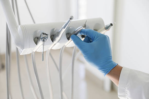 Professional Tooth Extraction technician working in Logan, NM